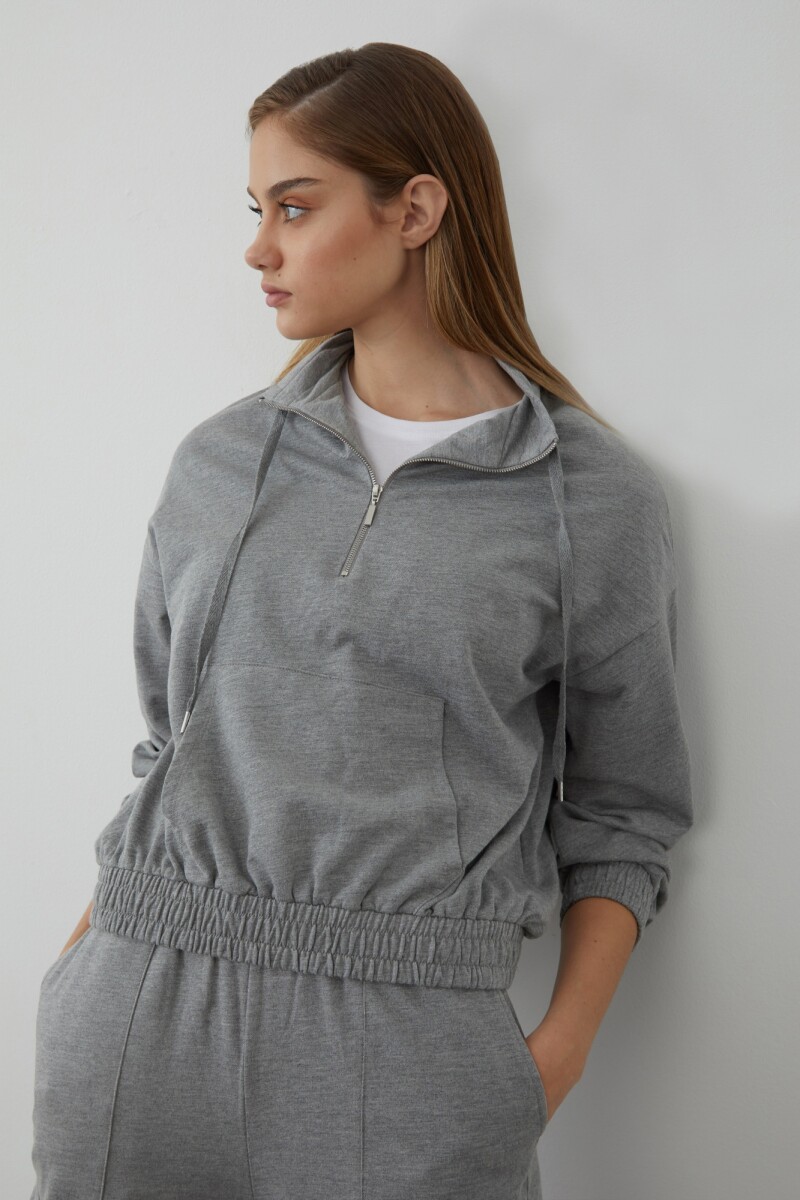 Sweater con cierre gris melange